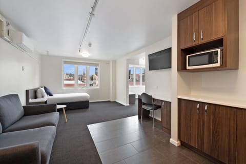 Suite | Desk, iron/ironing board, bed sheets