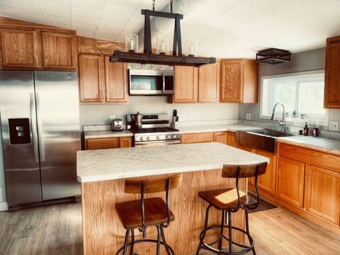 Light and bright kitchen with all new stainless appliances!!