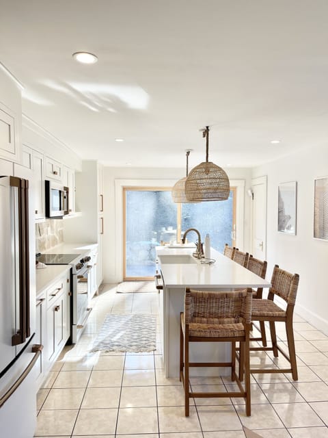 Brand new kitchen with oversized slider to take you onto the back patio