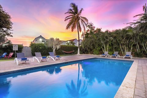 Lounge by the shimmering pool, where every day feels like a vacation.