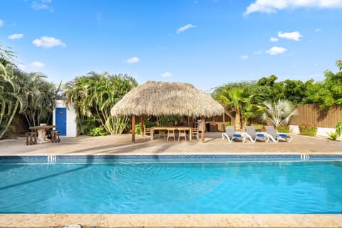 Relaxing Pool Area Located Behind The Property