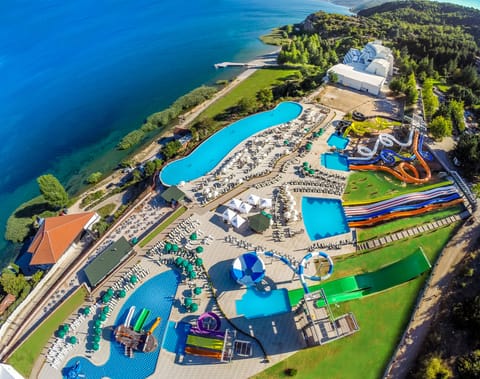Indoor pool, seasonal outdoor pool, pool umbrellas, sun loungers