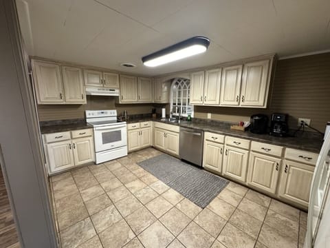Kitchen with electric stove/oven, dishwasher, refrigerator &  microwave
