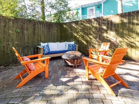 Shady backyard with fire pit