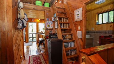 Main Level Hallway with Stairs to a Loft Area