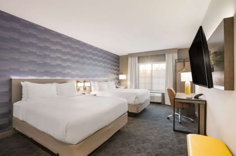 Desk, laptop workspace, blackout drapes, iron/ironing board