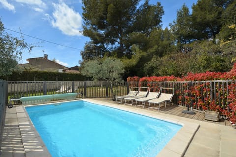Secured pool with 8 sunbeds