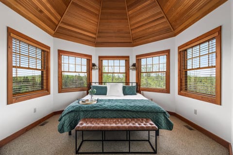 Primary suite with King bed, seating area, ensuite