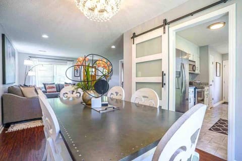 Dining Room table looks into kitchen.