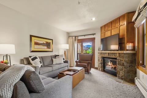 Cozy up by the fireplace after a day on the slopes