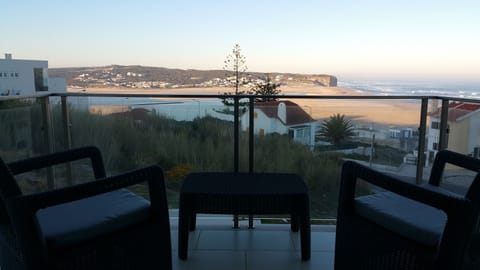 Relax with a glass of wine on the Bedroom Deck at Sunset