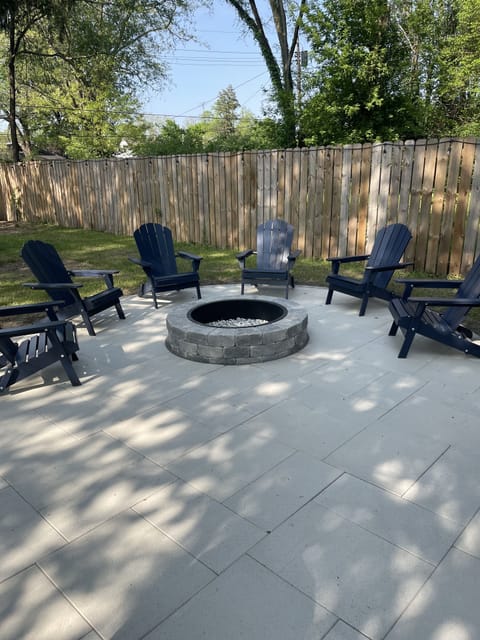 New paver patio with built in fire pit. Plenty of space to entertain friends!