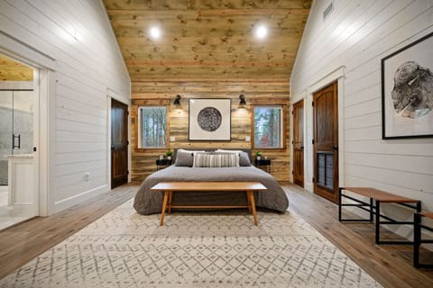 A sun filled room with blackout shades, a king bed and our favorite sheets. You won't want to get out of bed.
