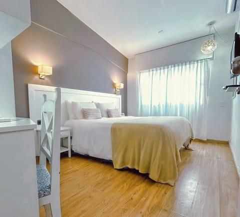 Double Room, 1 Double Bed | Minibar, in-room safe, desk, laptop workspace