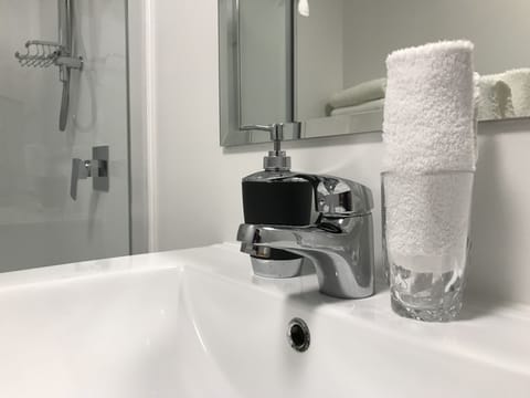 Blackout drapes, soundproofing, free WiFi, bed sheets