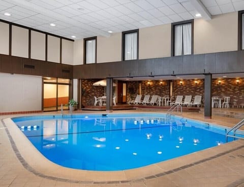Indoor pool, outdoor pool, open 6:00 AM to 10:00 PM, sun loungers