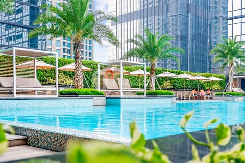 Indoor pool, outdoor pool, pool umbrellas