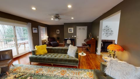 Main living room with seating and TV