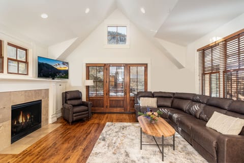 The great room is a wonderful gathering place. Vaulted ceilings and a southern exposure deck!Less than a half block from the Gondola and less than a half block from Main Street!.