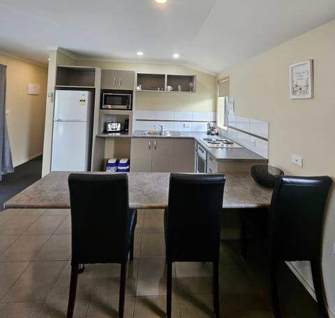 Executive Apartment, 1 Bedroom | Private kitchen | Microwave, electric kettle, toaster
