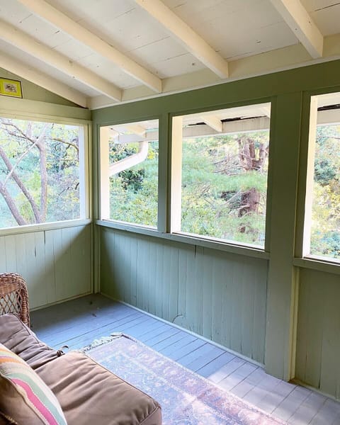 Sleeping porch off of upstairs bedroom. It’s like being in a treehouse. 