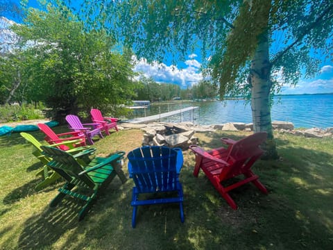 Gorgeous fire pit & seating area right on the bay.