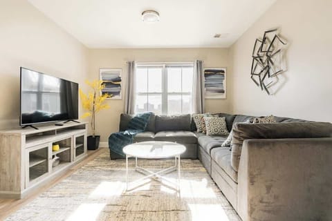 living room with 55 inch Smart TV