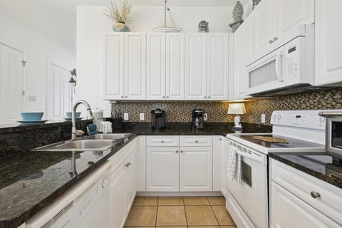 3rd Floor Full Size Kitchenw with Bar Seating