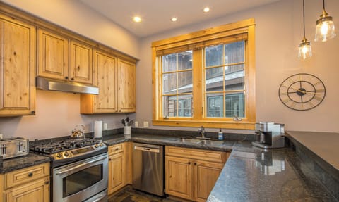 Open Designed Kitchen with Stainless Steel Appliances