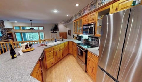 Large kitchen island with lots of space and chairs