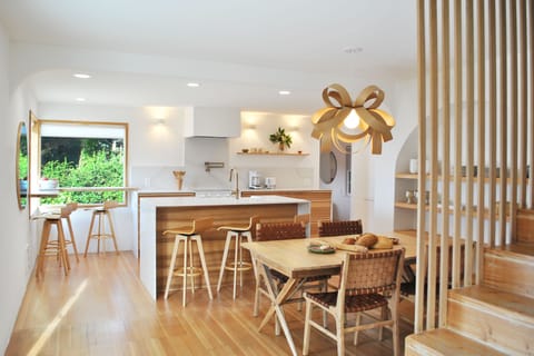 Wonderful organic materials and shapes in the dining & kitchen area.