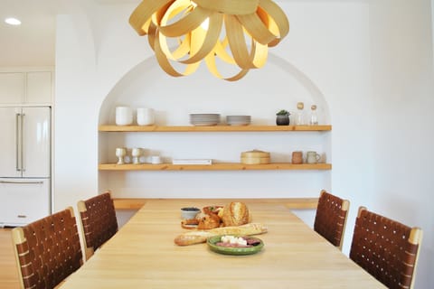 Enjoy a wonderful meal around the dining table.