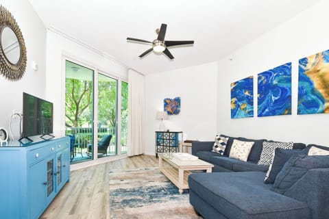 The Palms of Destin 2104 - Living Area with TV and Patio Access