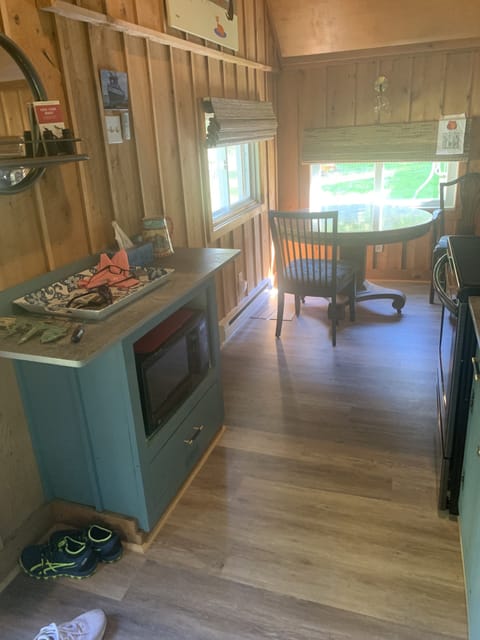 Galley kitchen (microwave at left), looking toward dining area