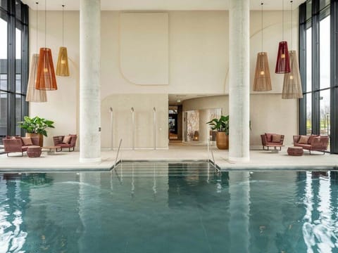 Indoor pool, open 7:00 AM to 11:00 PM, sun loungers