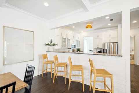 Beautiful living room w/ TV, dining, and kitchen!