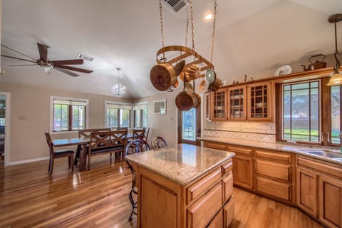 Seating for 8 at the dining table and 2 addition seats  at the breakfast bar.