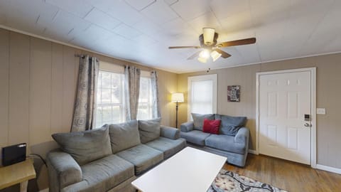 living room with very comfortable couches, smart tv perfect for casting or streaming