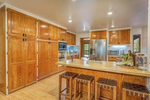 Butcher board kitchen island with seating for 4