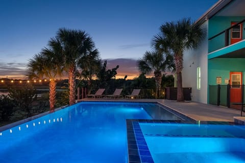 35 foot long infinity pool with sunpad and hot tub.