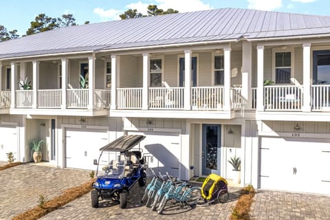 Enjoy a full townhome including parking for two cars, a garage, balcony & patio.