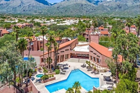Pool, spa, and community clubhouse with the beautiful Mountain Views