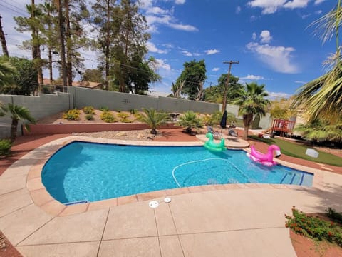 Large play pool in spacious shared backyard