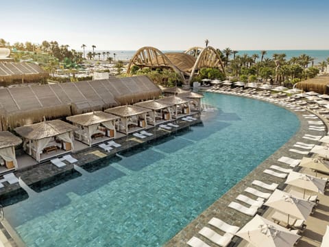 Indoor pool, 3 outdoor pools, cabanas (surcharge), pool umbrellas