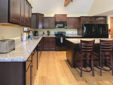Fully Stocked Kitchen with ample prep space