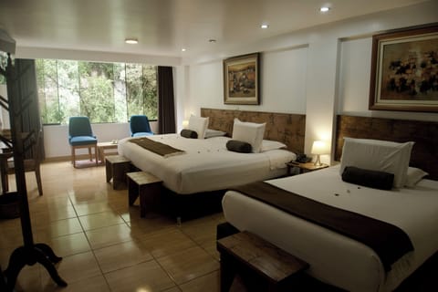 Family Room | Pillowtop beds, in-room safe, iron/ironing board, WiFi (free)