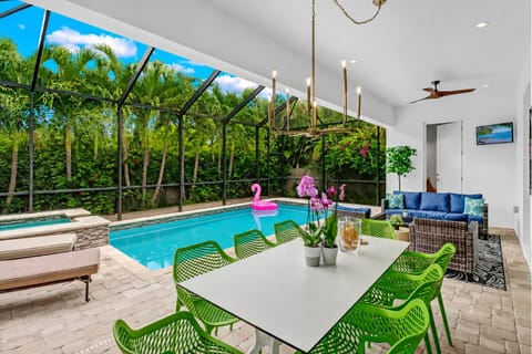 Massive outdoor living w 2 tvs, hot tub, kitchen, BBQ, pool bath, etc.