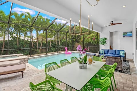 Expansive Lanai with plenty of seating, pool bath, and outdoor shower
