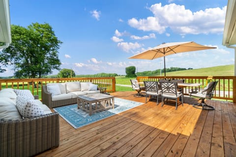 Ample seating for a dinner party or happy hour on the new deck under the stars.