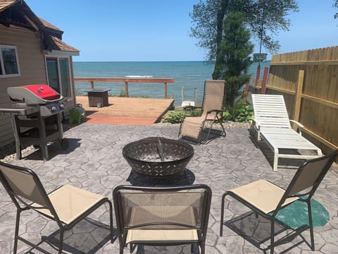 Brand new large patio with firepit, grill, and phenomenal lake views